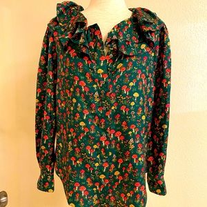 Silk blouse with a fun mushroom pattern and ruffles